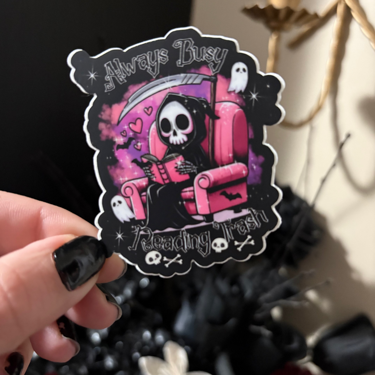 Vinyl Sticker: Always Busy Reading Trash Reaper in Pink Chair